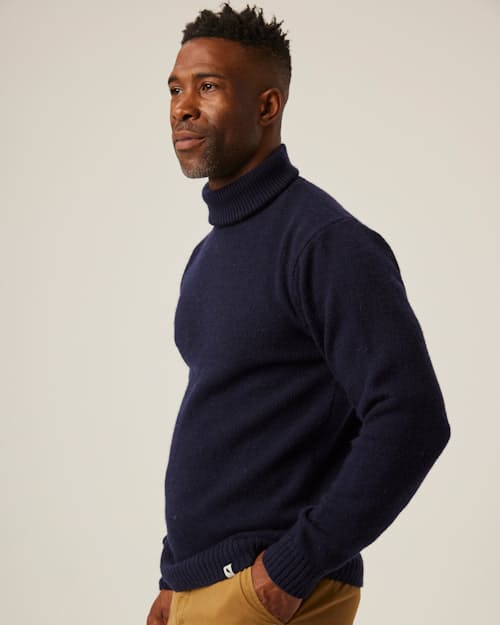 on model image of Merino Wool Turtleneck