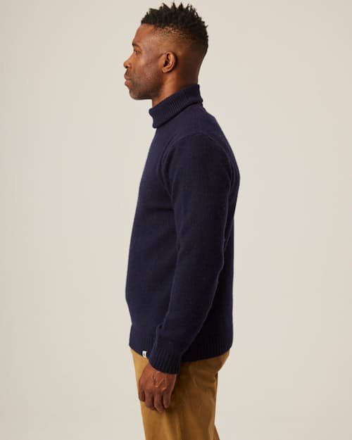 on model image of Merino Wool Turtleneck