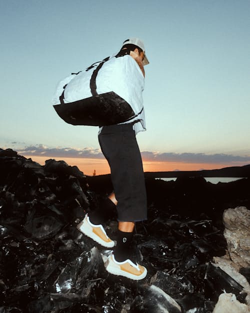 lifestyle image of 003 G+ Slip on Waterproof Trail Sneaker