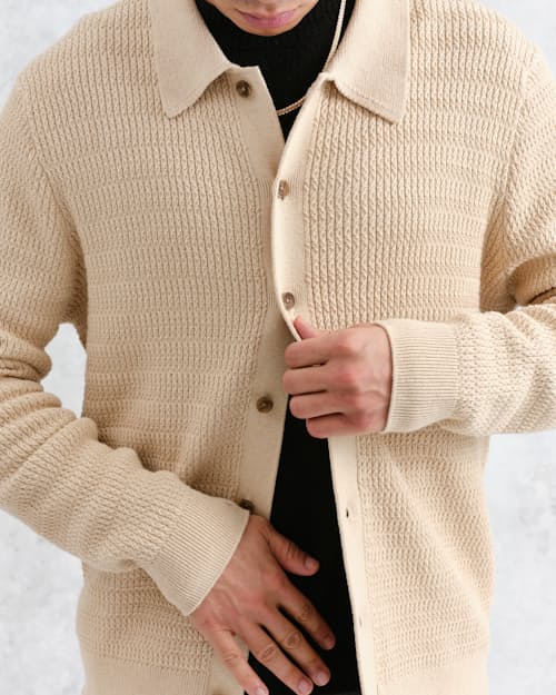 on model image of Tristan Cable Stitch Sweater Polo