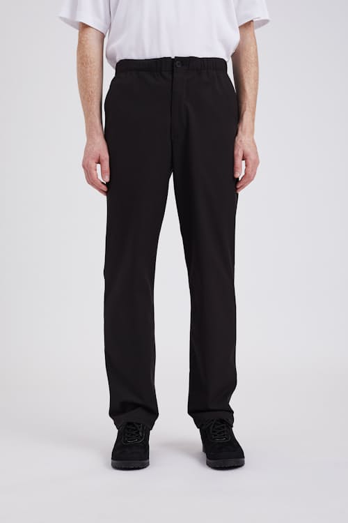 on model image of Ezra Relaxed Solotex DWR Trouser