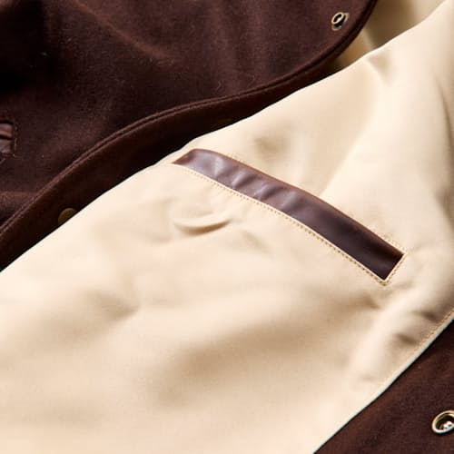 laydown detail image of Leather and Wool-Blend Varsity Bomber Jacket