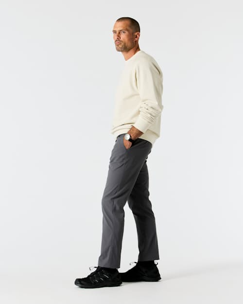 on model image of Nomad Performance Chino - HB Athletic Tapered
