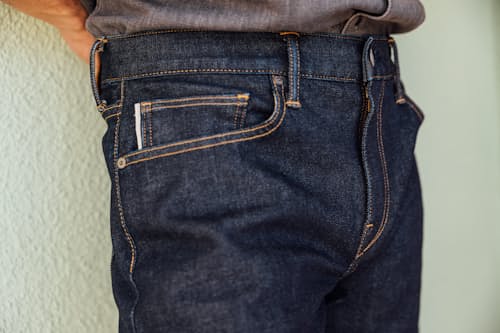 lifestyle image of The Hammer Straight Stretch Selvedge Denim Jeans