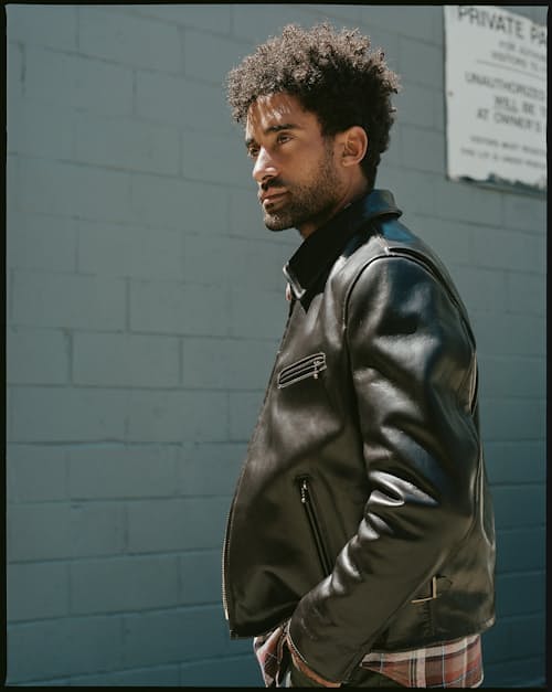 lifestyle image of Classic Leather Racer Motorcycle Jacket