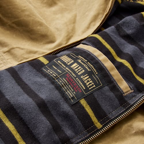 laydown detail image of Flannel-Lined Hooded Waxed Jacket