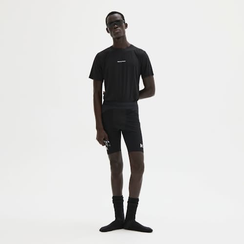 on model image of District Vision x Maurten Elite Fuel Half Tights