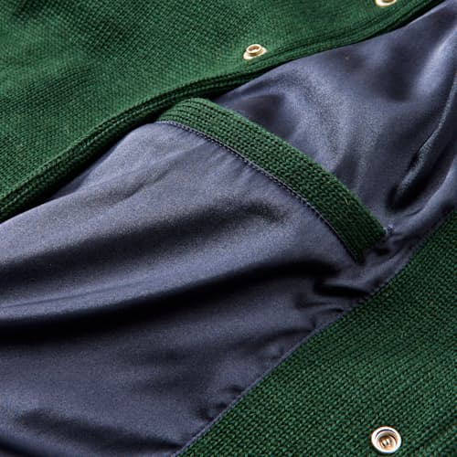 laydown detail image of Women's Knit Varsity Bomber Jacket