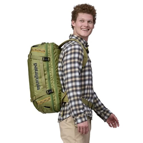 on model image of Black Hole MLC Travel Backpack - 45L