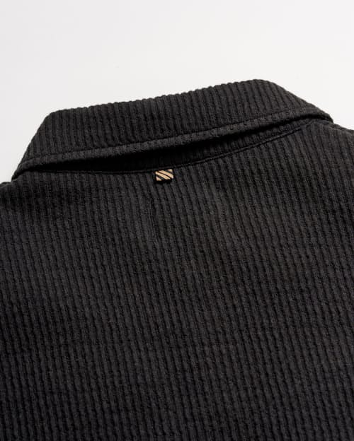 laydown detail image of Needle Drop Long Sleeve Polo