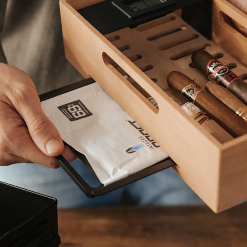 lifestyle image of The Smoke Can - 50 Cal Humidor