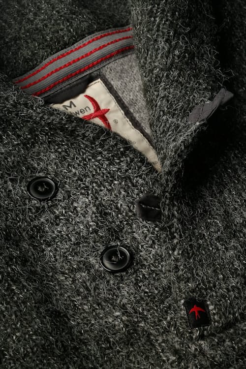 laydown detail image of Old Salt Shawl Sweater