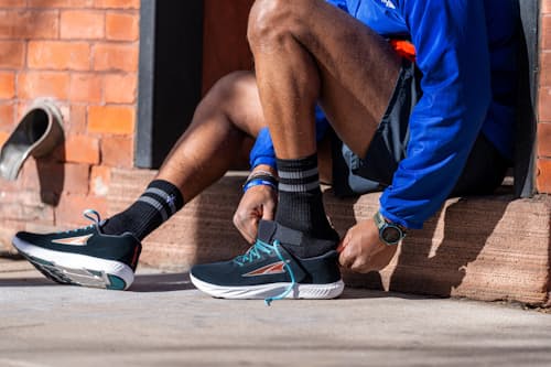 lifestyle image of Escalante 4 Running Sneaker