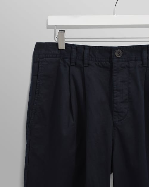 laydown detail image of Raleigh Pleated Tapered Pant