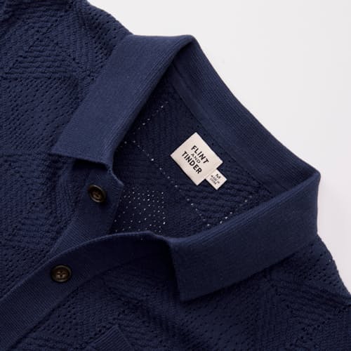 laydown detail image of Textured Button-Up Sweater Polo