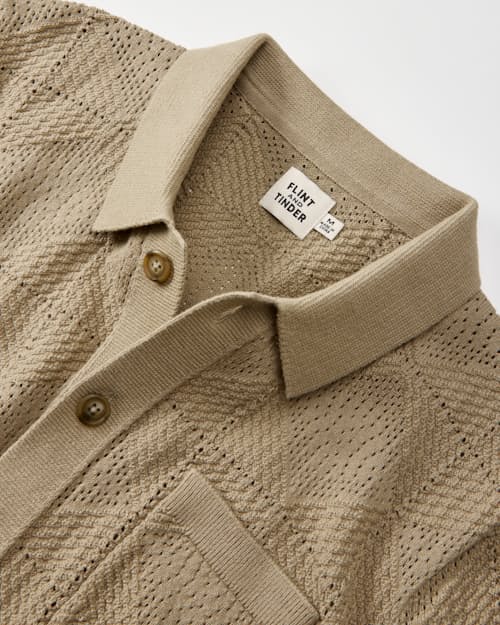 laydown detail image of Textured Button-Up Sweater Polo
