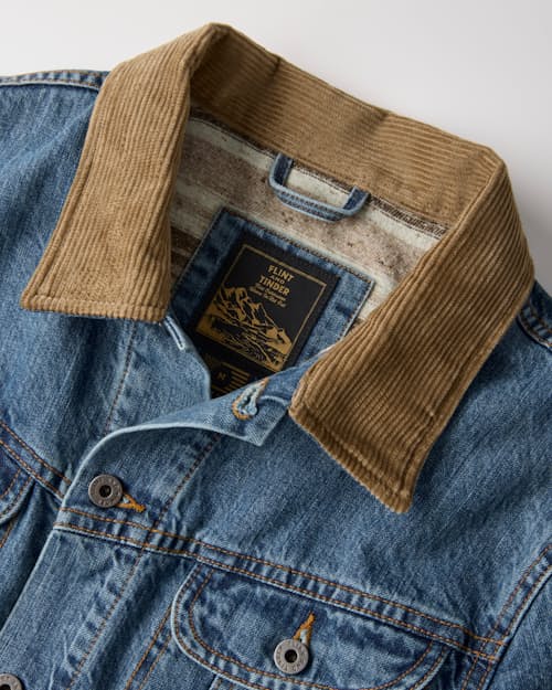 laydown detail image of Flannel-Lined Denim Trucker Jacket