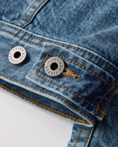 laydown detail image of Flannel-Lined Denim Trucker Jacket