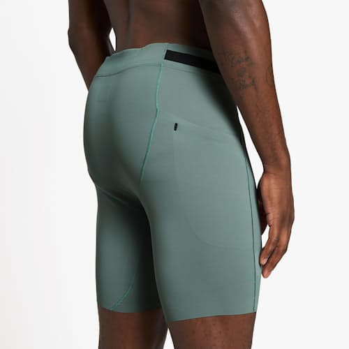 on model image of FST Short Tights - 8"