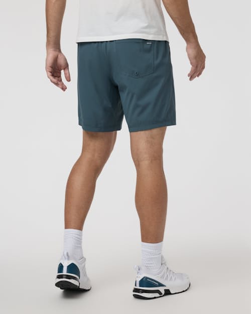 on model image of Kore Performance Shorts - 7.5"