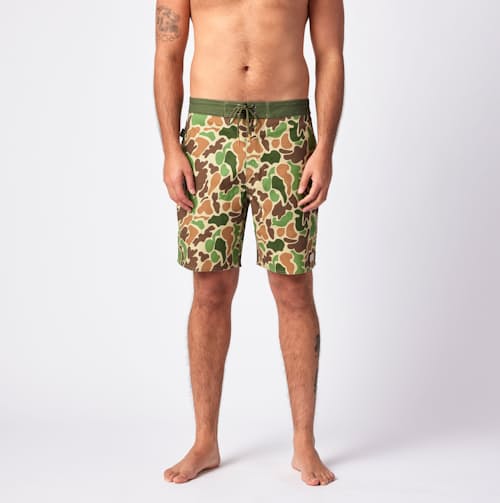 on model image of Goldmine Swim Boardshorts