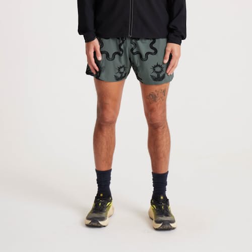on model image of Alta Run Shorts - 5"
