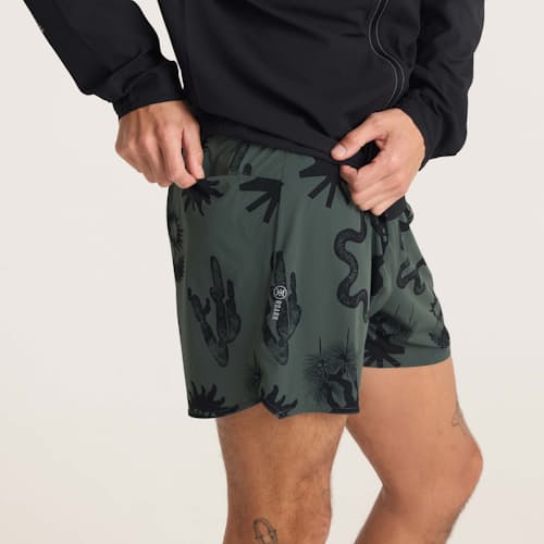 on model image of Alta Run Shorts - 5"
