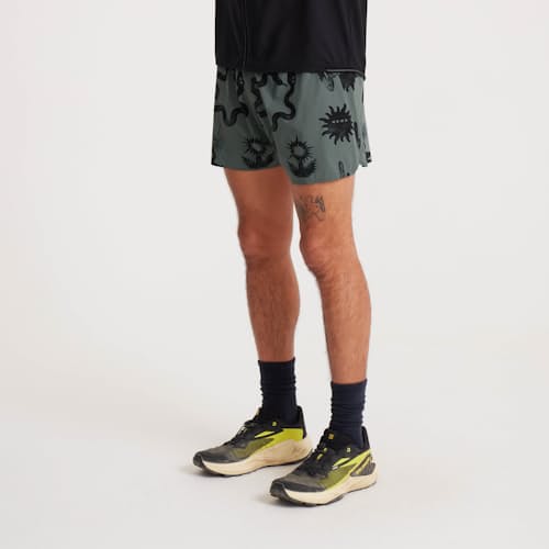 on model image of Alta Run Shorts - 5"