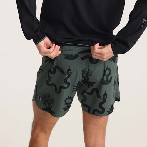 on model image of Alta Run Shorts - 5"