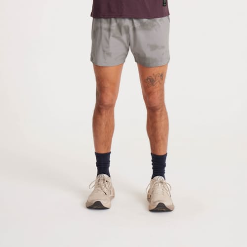 on model image of Alta Run Shorts - 5"
