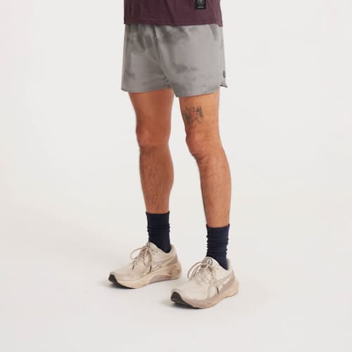 on model image of Alta Run Shorts - 5"