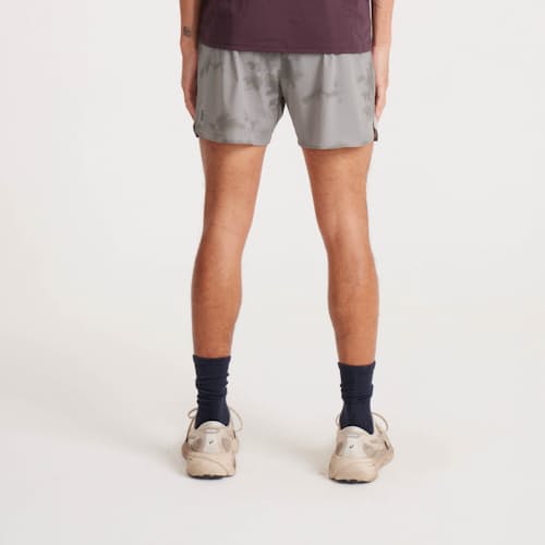 on model image of Alta Run Shorts - 5"