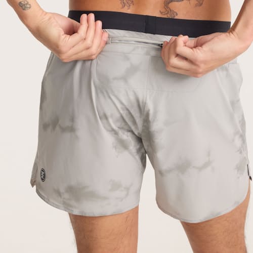 on model image of Alta Run Shorts - 5"