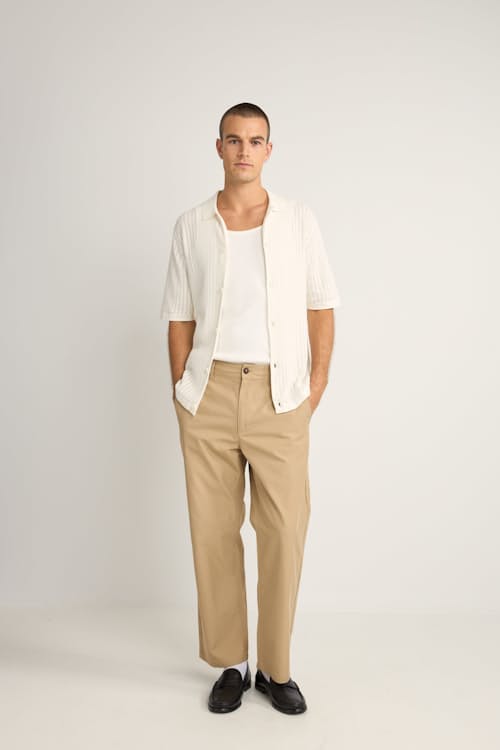 on model image of Knit Button Down Polo