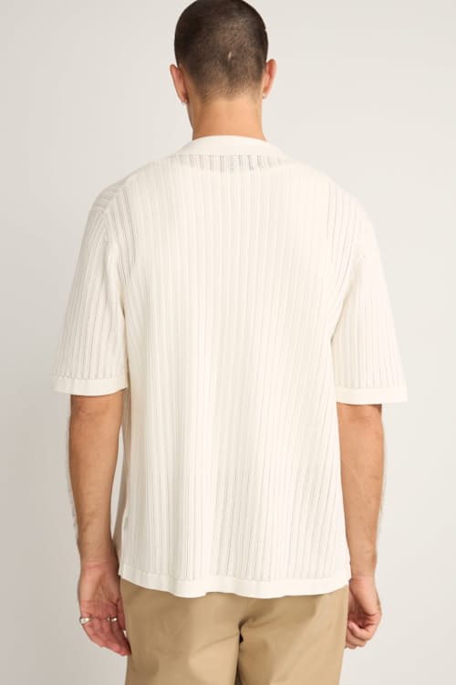 on model image of Knit Button Down Polo