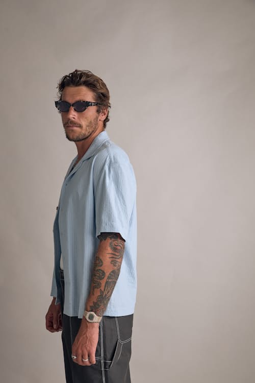 on model image of Relaxed Cropped Short Sleeve Shirt