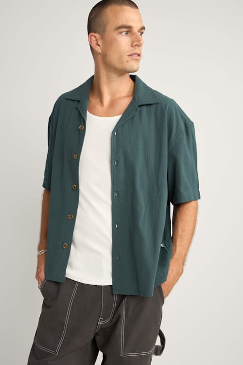 on model image of Relaxed Cropped Short Sleeve Shirt