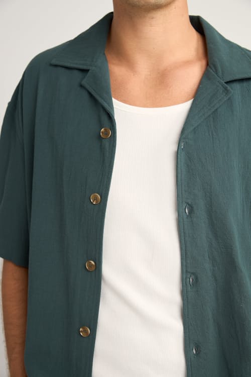 on model image of Relaxed Cropped Short Sleeve Shirt
