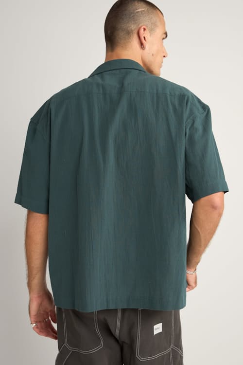 on model image of Relaxed Cropped Short Sleeve Shirt
