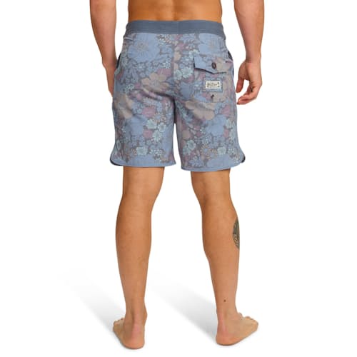 on model image of Bruja Boardshorts - 8"