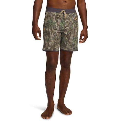 on model image of Bruja Boardshorts - 8"