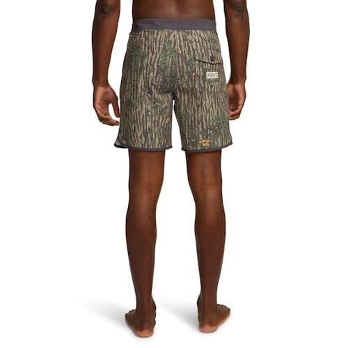 on model image of Bruja Boardshorts - 8"