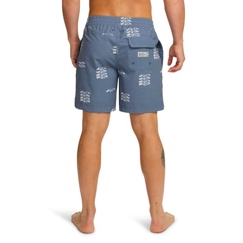 on model image of Deep Set Swim Trunks - 7"