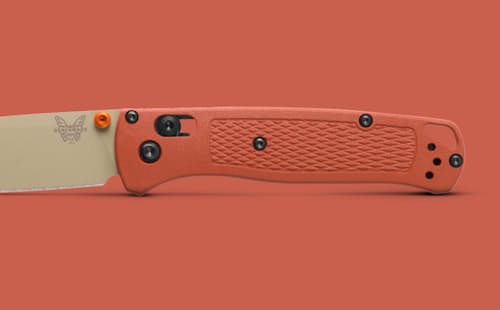 lifestyle image of Bugout Rust Orange Grivory Pocket Knife