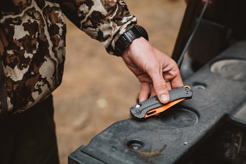 lifestyle image of Taggedout Carbon Fiber Pocket Knife