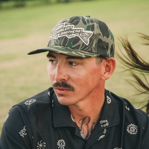 lifestyle image of Trout Bolt Mesh Snapback Hat