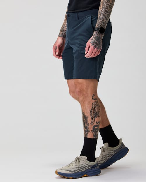 on model image of Equator Cargo Hybrid Short - 9"