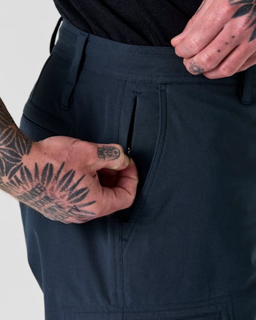 on model image of Equator Cargo Hybrid Short - 9"