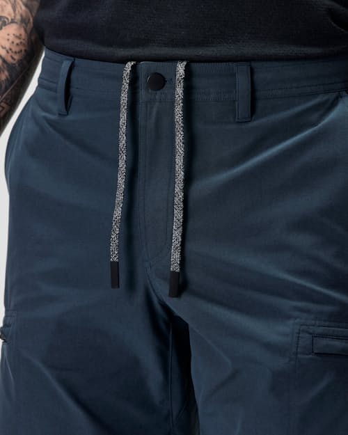 on model image of Equator Cargo Hybrid Short - 9"