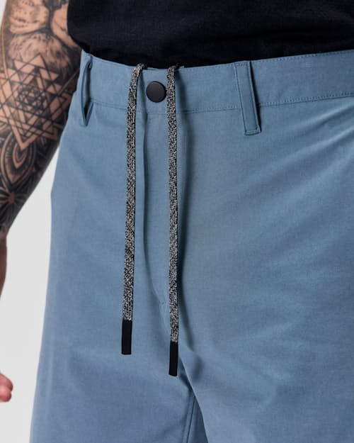 on model image of Equator Hybrid Short - 9"